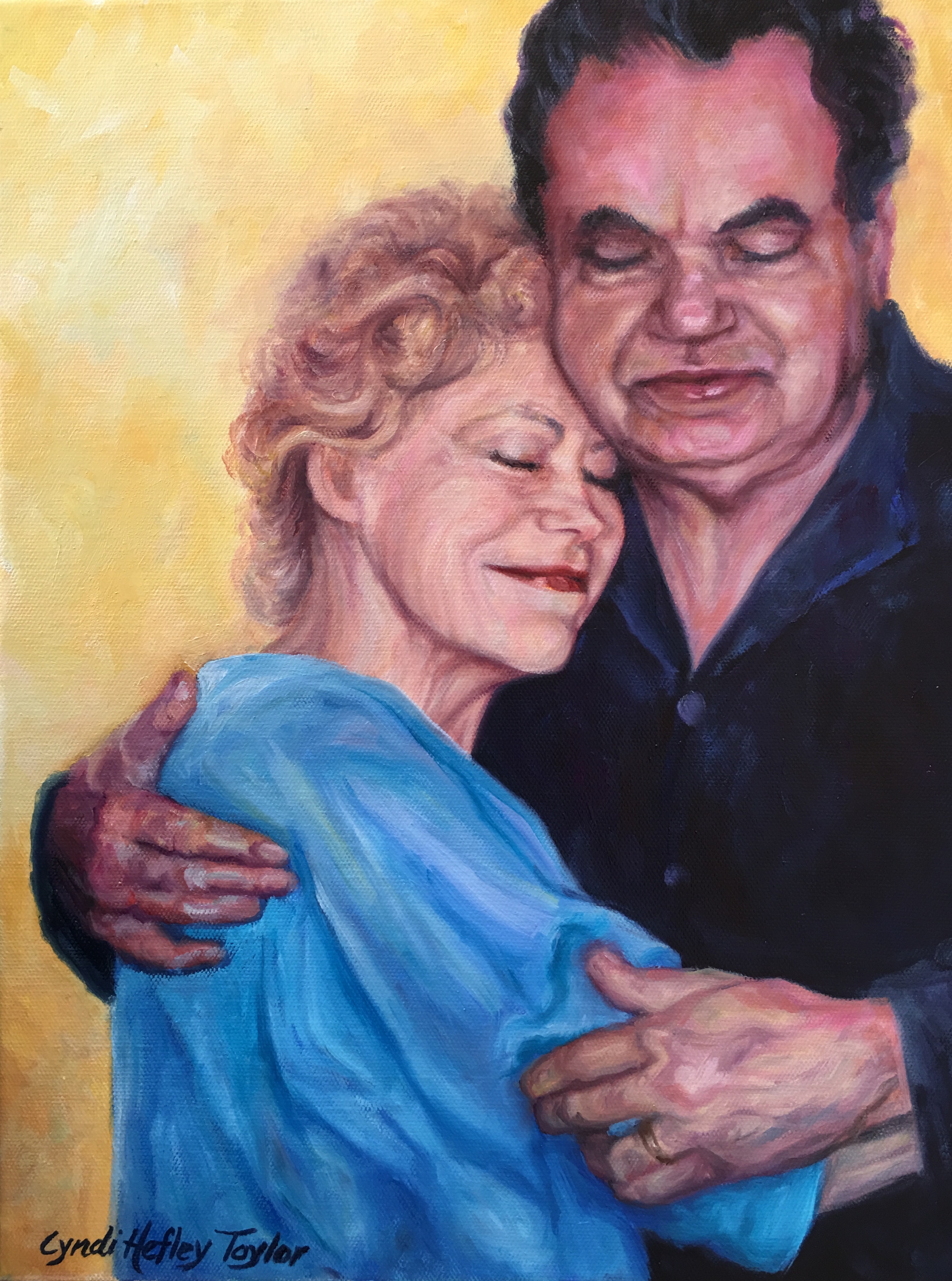 Couple embracing with eyes closed